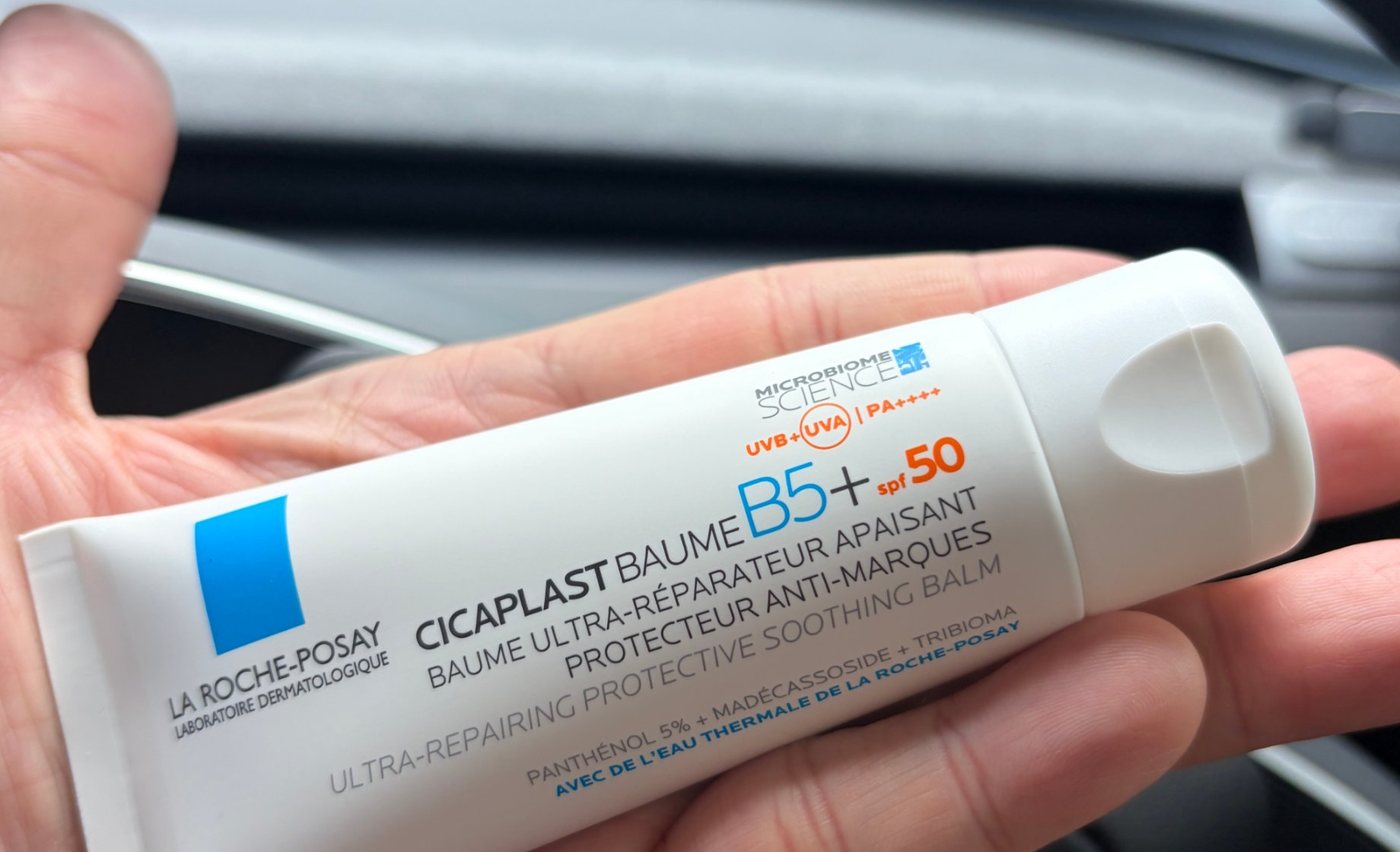 La Roche-Posay Cicaplast Baume B5+ SPF 50 held in hand, front label showing SPF 50 and the UVA mark